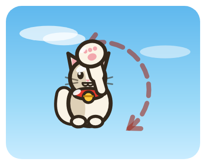 A ceramic lucky cat, its paw sweeping an arc